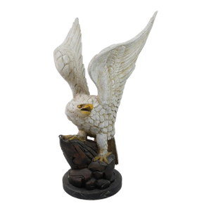 A Wooden Carved Eagle With Spread Wings