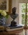 A handsome late 20th-century brass bust depicting Apollo Belvedere, modeled with an idealized classical profile, swept...