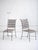 Set of five Florentine style wrought iron garden chairs. Classic silhouette with woven iron seats and backs.