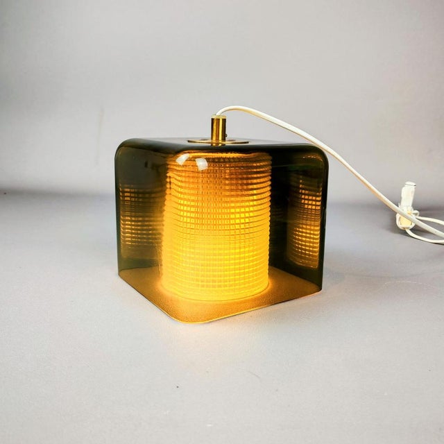 Carl fagerlund, ceiling lamp, orrefors, square outer bowl made of green glass, cylindrical inner bowl with a checkered...