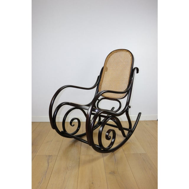 Rocking chair on runners, original brown colour, from the 1970s, in very good condition. Brown rocking chair, 1970s....