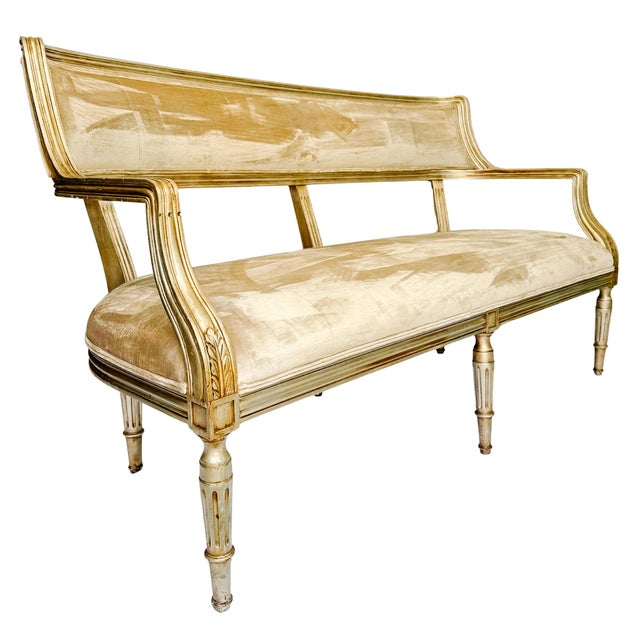 This vintage settee is a fine example of the French Louis XVI style, characterized by its elegant and balanced...