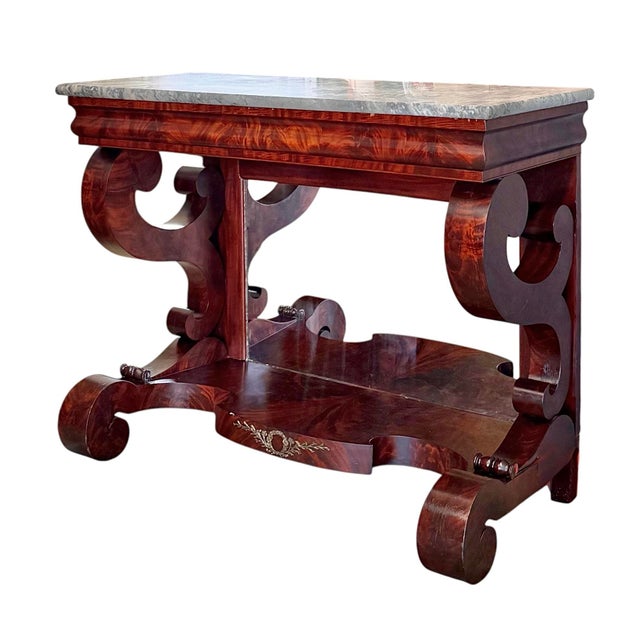 Date: Circa 1835 Materials: Mahogany, Poplar and White Pine secondary, Gilt bronze, Marble Maker: Attributed to J. and...