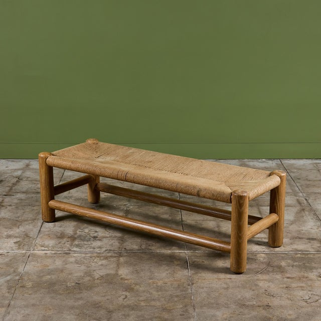 Woven rush bench by Dutch designer, Wim Den Boon c.1950's, Netherlands. The long bench features a solid beech wood frame...