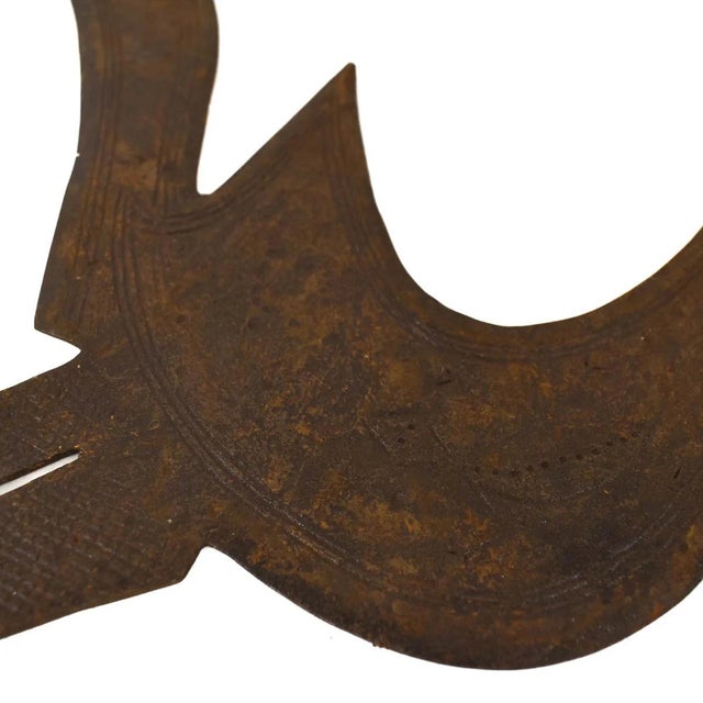 The Ngombe Throwing Knife Currency of Congo is a unique form of currency originating from the Ngombe people of the...