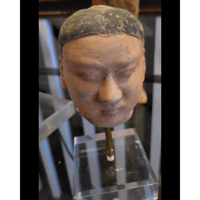 Ancient Chinese Han Dynasty Terracotta Head of an Attendant Period: Han Dynasty (206 BCE – 220 CE) Material: Painted...