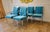 Step back into the futuristic elegance of the 1970s with these stunning chairs in the manner of Pierre Cardin for...
