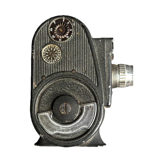 Produced by the iconic Bell & Howell Company, a cornerstone of mid-century American amateur cinematography. A classic...