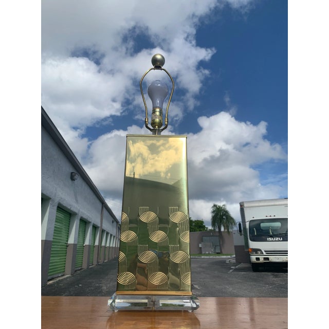 Beautiful Pierre Cardin style Italian brass and lucite table lamp. Very unique, mid century modern designs around the...