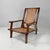 Armchair with rectangular base. The seat and backrest are covered in Vienna straw. The structure is entirely made of wood...