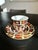 An exquisite vintage Royal Crown Derby Old Imari 1128 tea trio, featuring a teacup, saucer, and matching tea plate crafted...