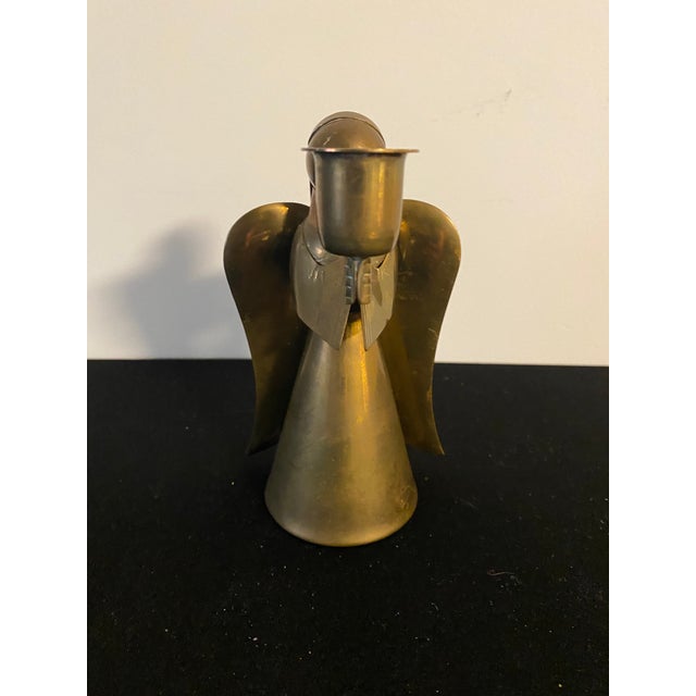 Vintage Handmade Brass and Copper Praying Angle Candle Holder Approx overall size 3 1/2 x 3 x 6 1/2" with 2 1/4" diameter...