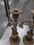The candleholders appear to be antique, from an Art Deco period. I tried to detach a clean on of the candleholders but not...