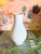 Stunningly beautiful pristine white porcelain vase in the most pleasing and timeless shape and design, by the well known...