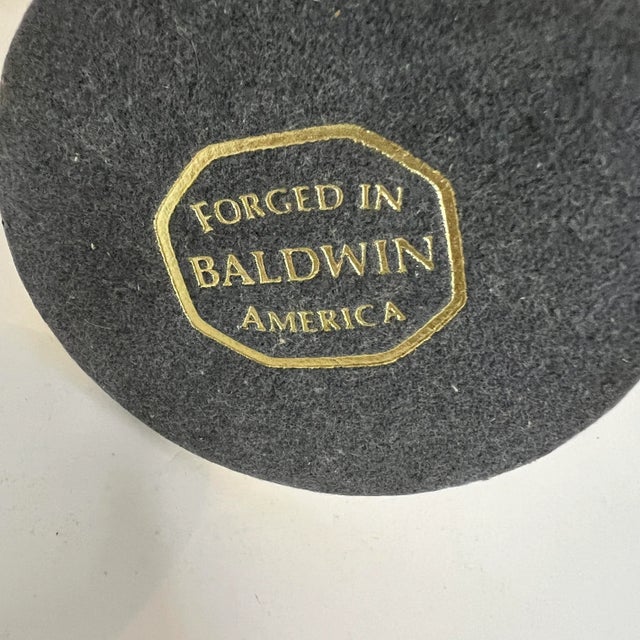 Baldwin brass candlesticks ranging in height from 3” - 7”. The two square base are missing the felt. Each measures 3” wide...