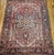 "This exquisite early 20th-century Persian Heriz rug features the coveted Serapi design and a striking room-size format,...