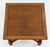 An early 20th-century Jacobean Revival oak draw-leaf table, circa 1920s, featuring a beautifully grained 36-inch square...