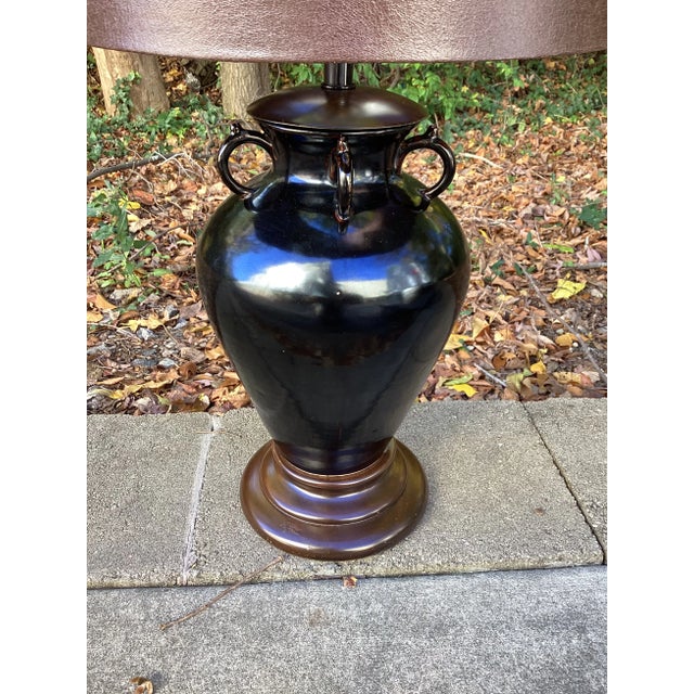 This is one for the Man Cave! High Quality, medium scale urn with gorgeous leatherette shade. Very masculine. Great for a...