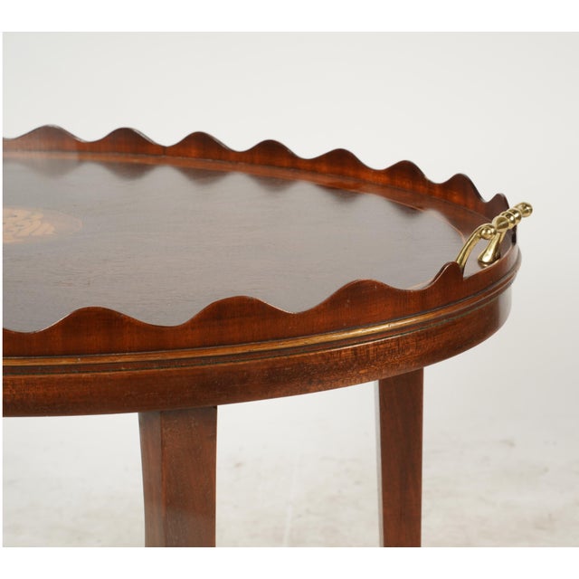 Vintage Neoclassical-Style Mahogany Oval Tray-Top Table late 20th century; the removable tray decorated with a shell and...