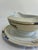 Hand-painted porcelain gravy boat by Meito China, made in Japan and marked “Warren” on the base. The boat is attached to...