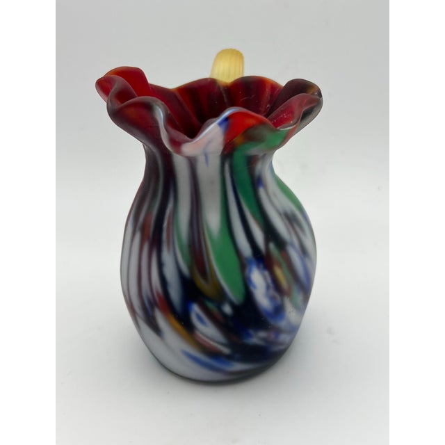 The multi-swirl Venetian glass jug is a decorative piece of art glass, made in the tradition of glass from Murano Island,...