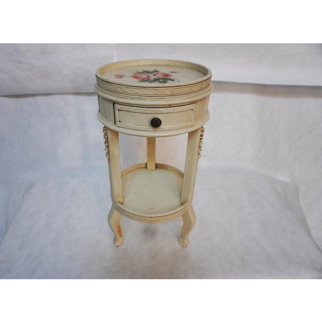 Round Side Table With Drawer and Removable Tray Top This piece is very sweet, with the painted floral arrangement on and...