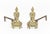 French Empire Style Brass Chenets, early 20th century, each column form with flame finial. 13" H x 18" W x 6.75" D....