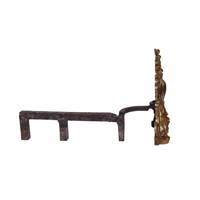 Pair of Antique classic French Rococo-style gilt bronze chenets. Iron log holders bolted to fronts disassemble for shipping.