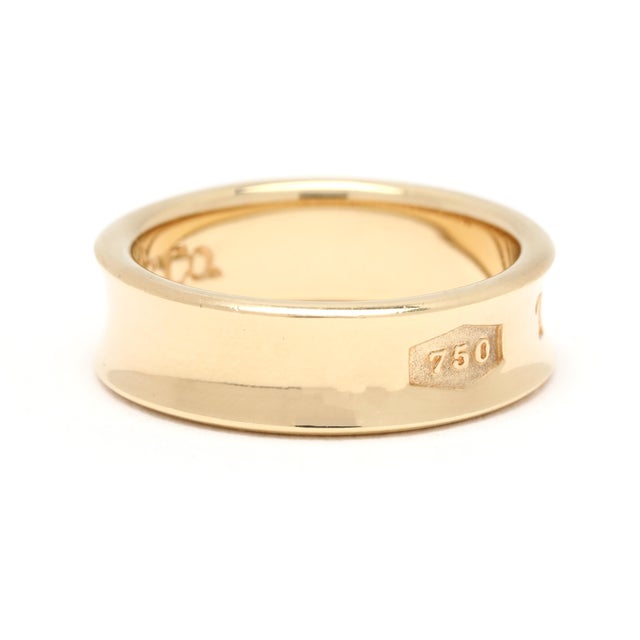 Ring Size: 6 Rise Off Of Finger: 1.7 mm Width: 5.9 mm Weight: 4.4 dwts/ 6.9 grams Metal: "1997 Tiffany & Co 750" *1837...