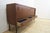 Teak sideboard with sliding doors and drawers, 1960s