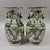 A matched mirror-image pair of Chinese Nanking crackle-glaze porcelain vases decorated in famille verte enamels with...