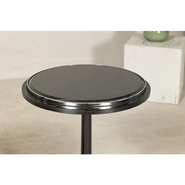 This striking pair of late 20th-century gueridon tables offers a bold, sculptural presence, perfect for contemporary...