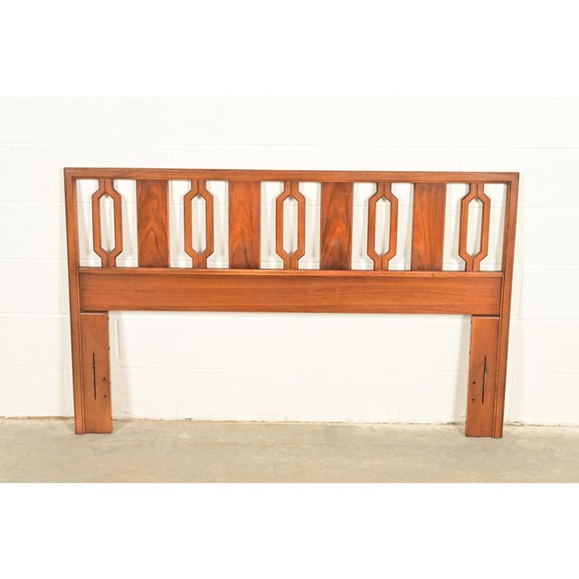 An exceptional Mid-Century Modern sculpted walnut queen size headboard In the manner of Broyhill Brasilia USA, 1960s...