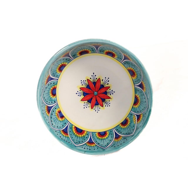 The Intreccio Teal Deep Pasta &amp; Soup Bowl brings centuries of Italian ceramic artistry to your table. Hand-painted by...