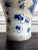 A korean white porcelain jar with underglaze blue paint circa late 19th century toward the end of Joseon Dynasty....