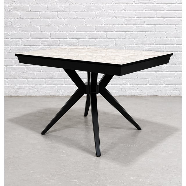 Atomic Mid Century Modern Ebonized Dining Table, c. 1950’s. Loads of delicious design features, from its amazing spider...