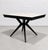 Atomic Mid Century Modern Ebonized Dining Table, c. 1950’s. Loads of delicious design features, from its amazing spider...