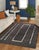 Talia Delicate Brown Flatweave Wool Rug, Country of Origin: India. This exceptional flatweave piece showcases the refined...