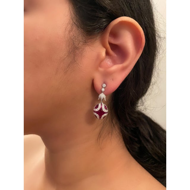 Elevate your jewelry collection with these exquisite Ruby Drop Earrings in a captivating Art Deco style, adorned with...