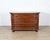 A handsome 17th-century Italian chest of drawers in solid walnut, notable for its sculptural, molded façade and warm,...