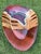 Large signed studio pottery platter with an organic freeform shape and layered oxblood, brown, purple, and turquoise...