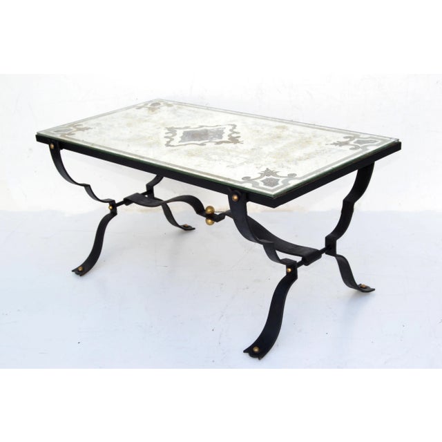 Art Deco Coffee Table, Sofa Table in the Style of Jean Charles Moreux. Features a Forged Iron & ebonized Base with Brass...