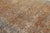 Hand knotted 10×15 antique orange-brown persian rug.