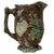 A richly modeled antique English majolica pitcher that brings the Victorian fascination with the natural world into...