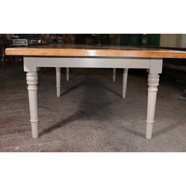 Gorgeous and large refectory table with an oak top and painted base. The table is bespoke and hand made to order by our...