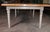 Gorgeous and large refectory table with an oak top and painted base. The table is bespoke and hand made to order by our...