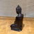 For your consideration, a hand-carved wooden Buddha statue, likely originating from Indonesia or Southeast Asia, depicted...