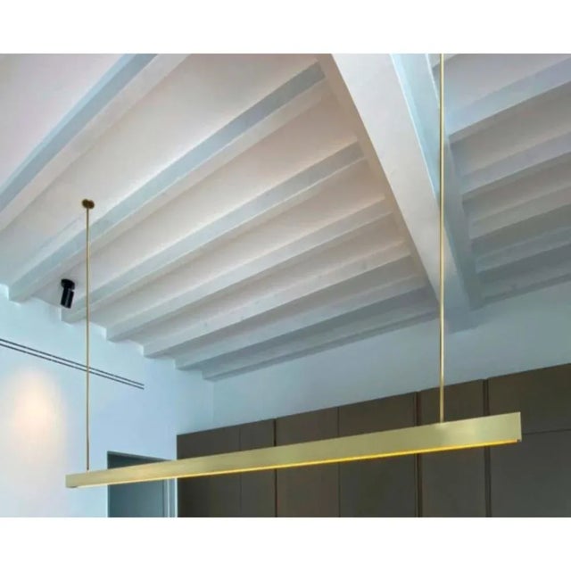 H pendant lamp 300 by ohlab dimensions: d 4.5 x w 300 x h 100 cm (custom length). Materials: brass structure, tubes or...