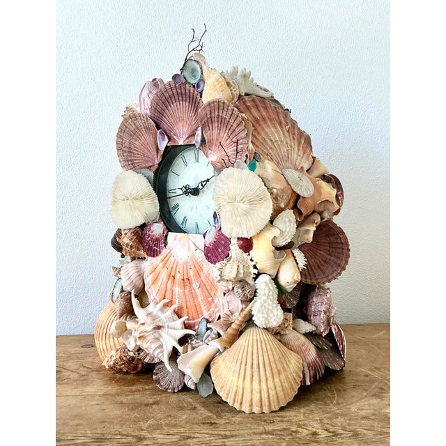 This whimsical vintage mantle clock is a stunning example of coastal artisanal craft, blending a relaxed bohemian...