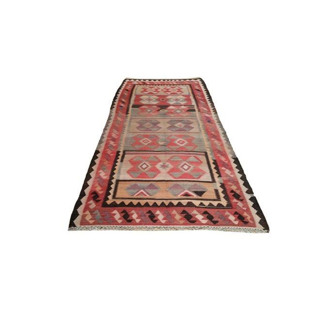 This beautiful rug is handmade. It is a Turkish rug made of fine wool in beautiful colors of red, brown, beige. The colors...